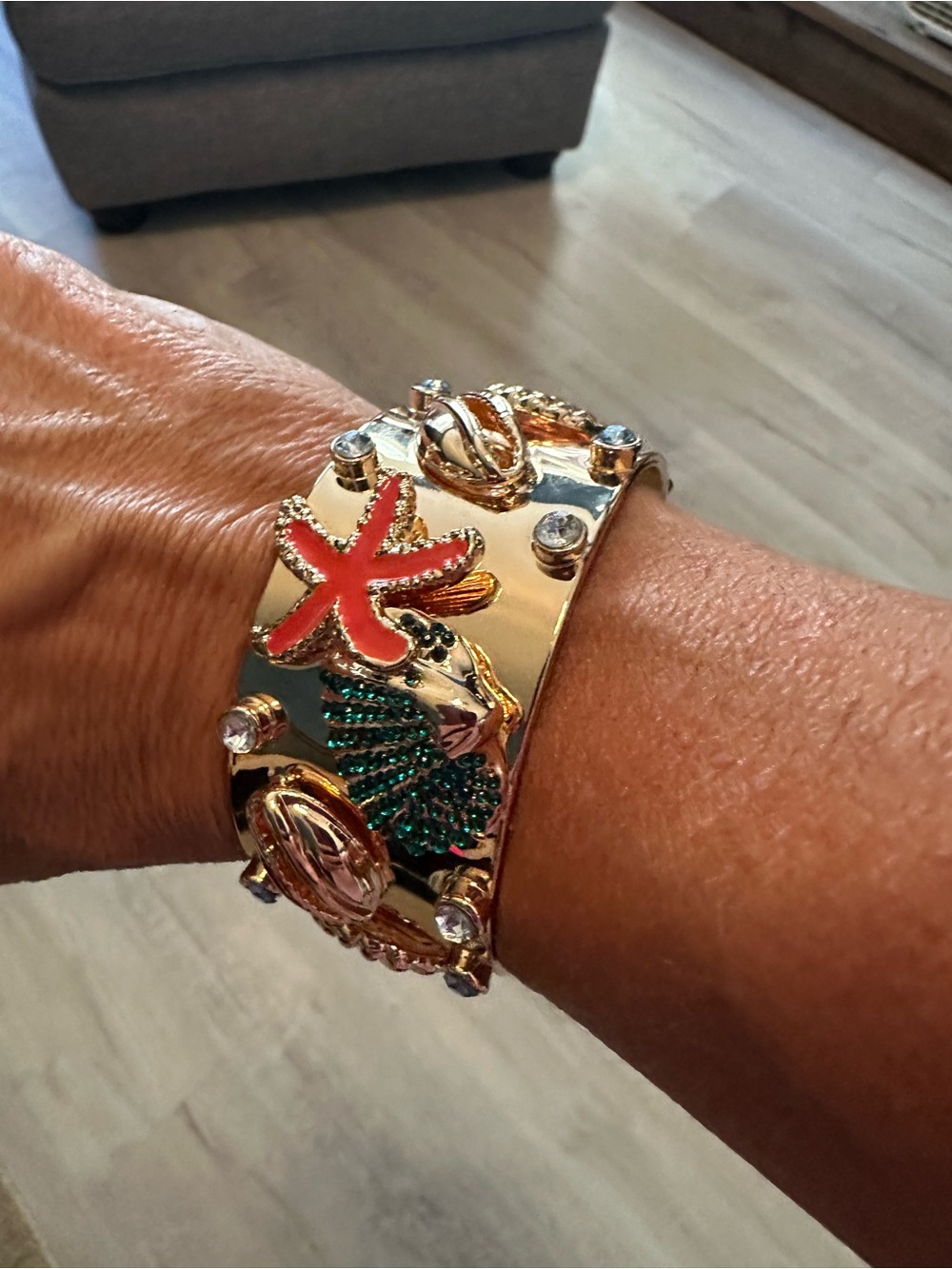 Gold-Tone Seashell & Starfish Cuff Bracelet with Coral and Teal Accents